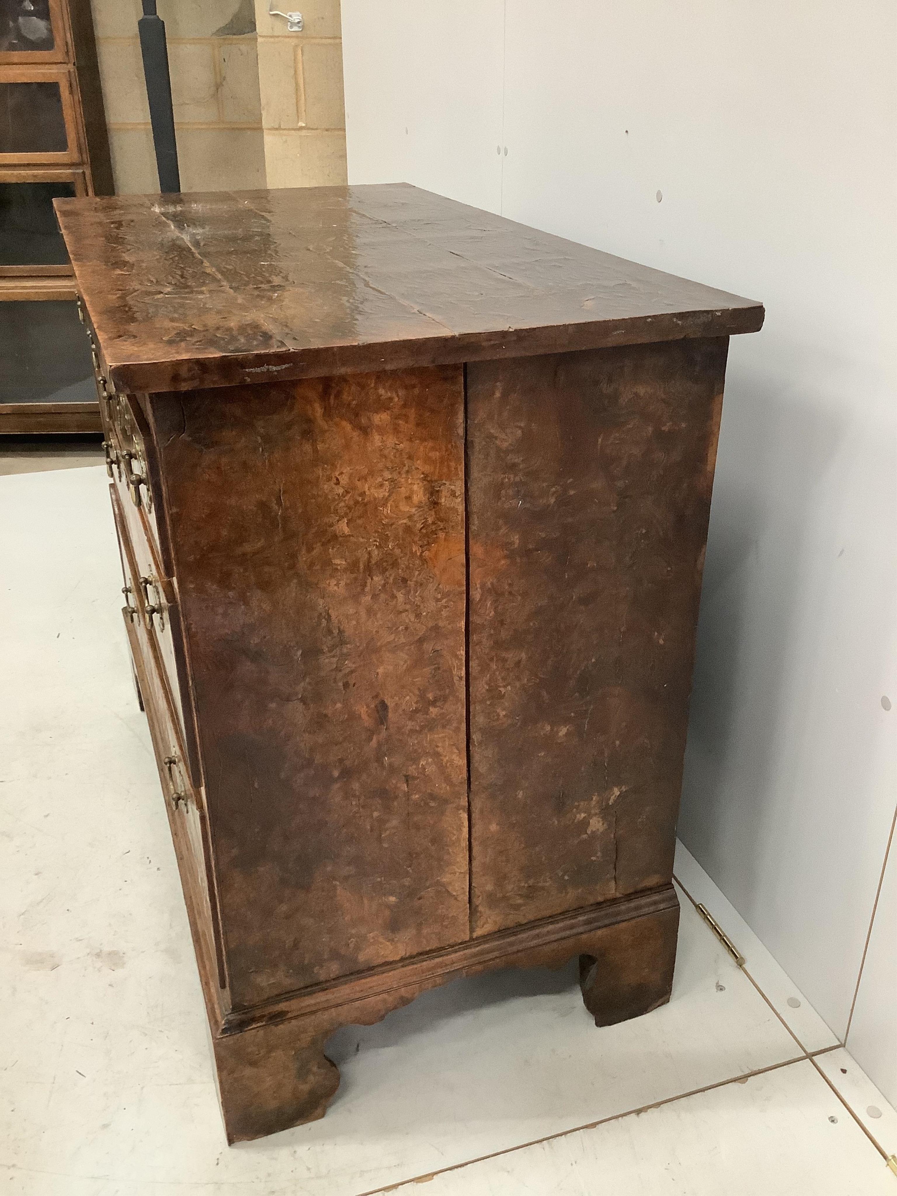 A George III burr elm chest of drawers, width 105cm, depth 57cm, height 86cm. Condition - fair